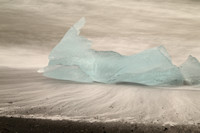 Iceberg in surf, Jokulsarlon