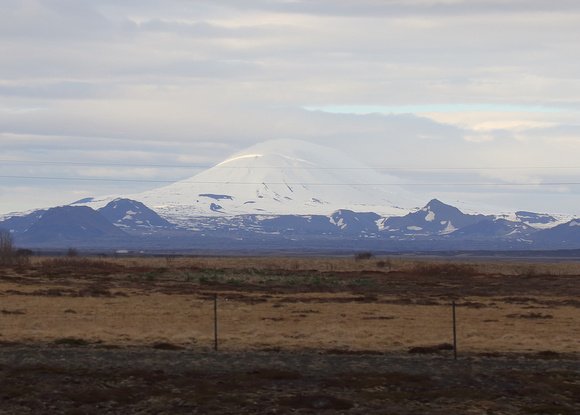 Hekla, with its hood of clouds, S. Iceland